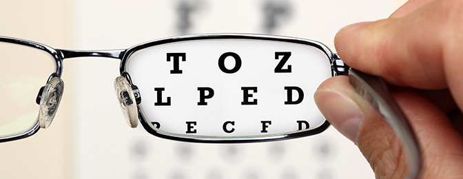 Viewing an eye test chart through eyeglasses