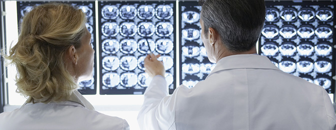 Neurologist examining MRI images